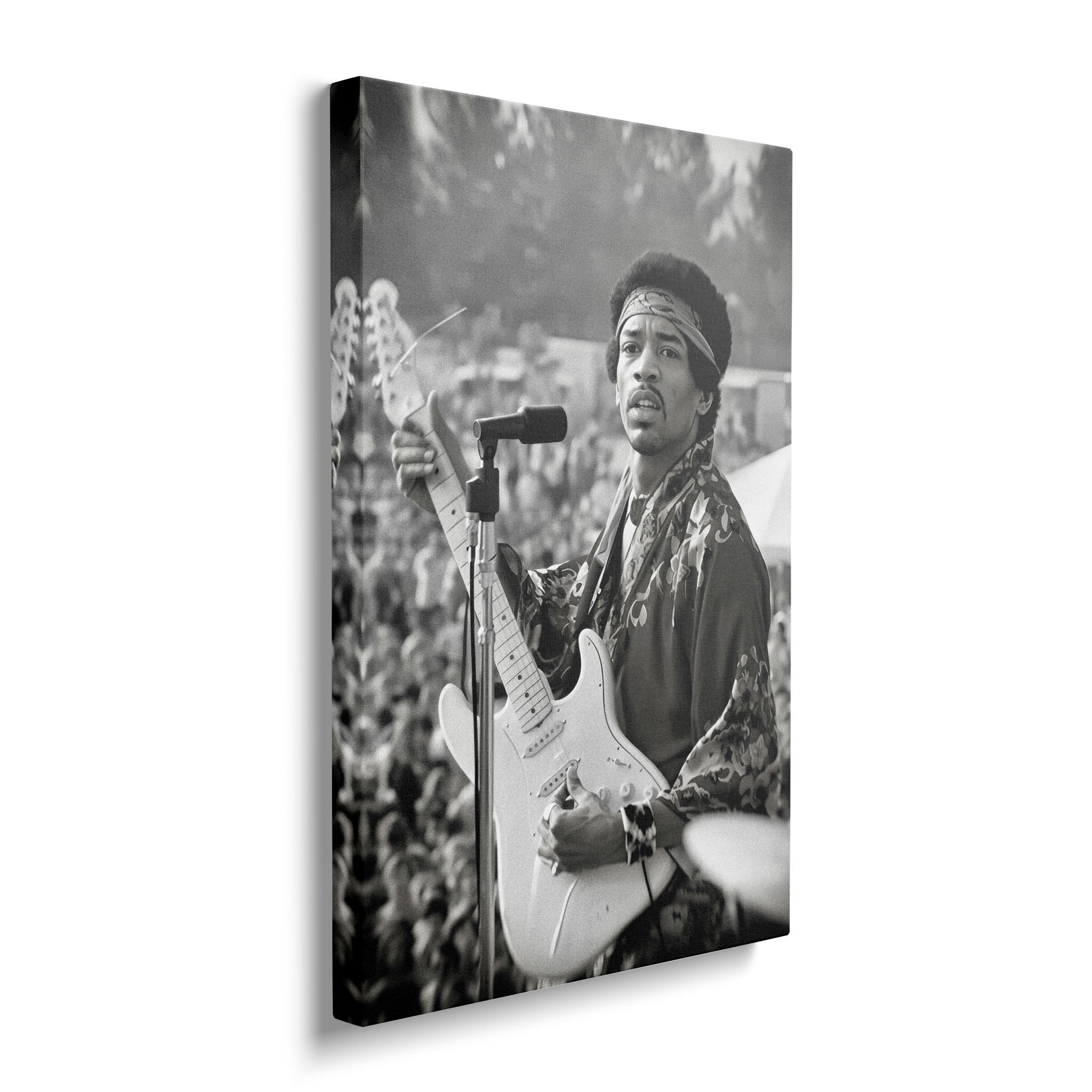 Gallery-wrapped black and white canvas of Jimi Hendrix at Newport displayed on a wall