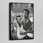 Angled view of the Jimi Hendrix black and white canvas in a black floating frame