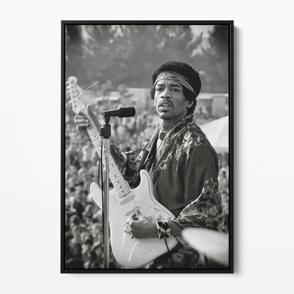 Front display of the Jimi Hendrix black and white canvas in a black floating frame