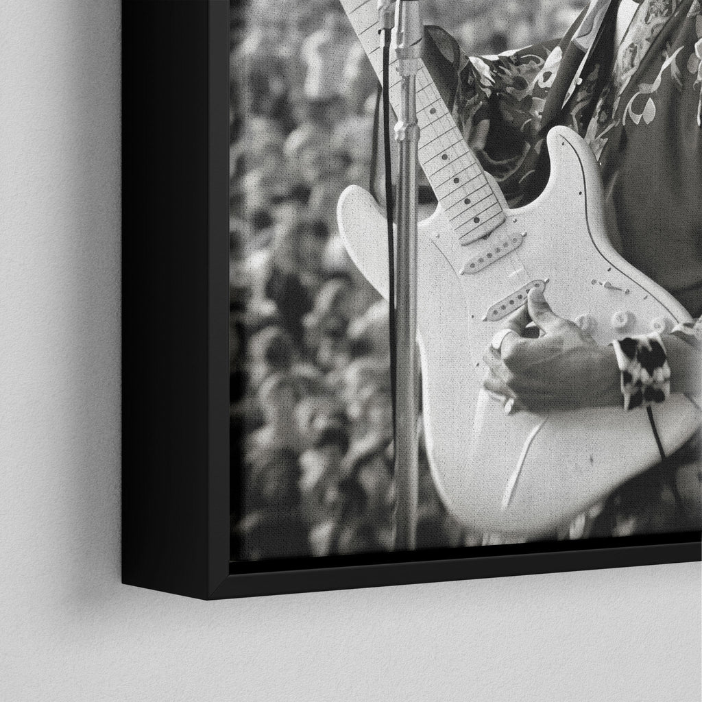 Corner close-up of the black floating frame on the Jimi Hendrix black and white canvas