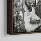 Close-up of the dark walnut floating frame on the Jimi Hendrix black and white canvas