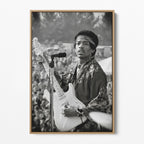 Front display of the Jimi Hendrix black and white canvas in a natural oak floating frame