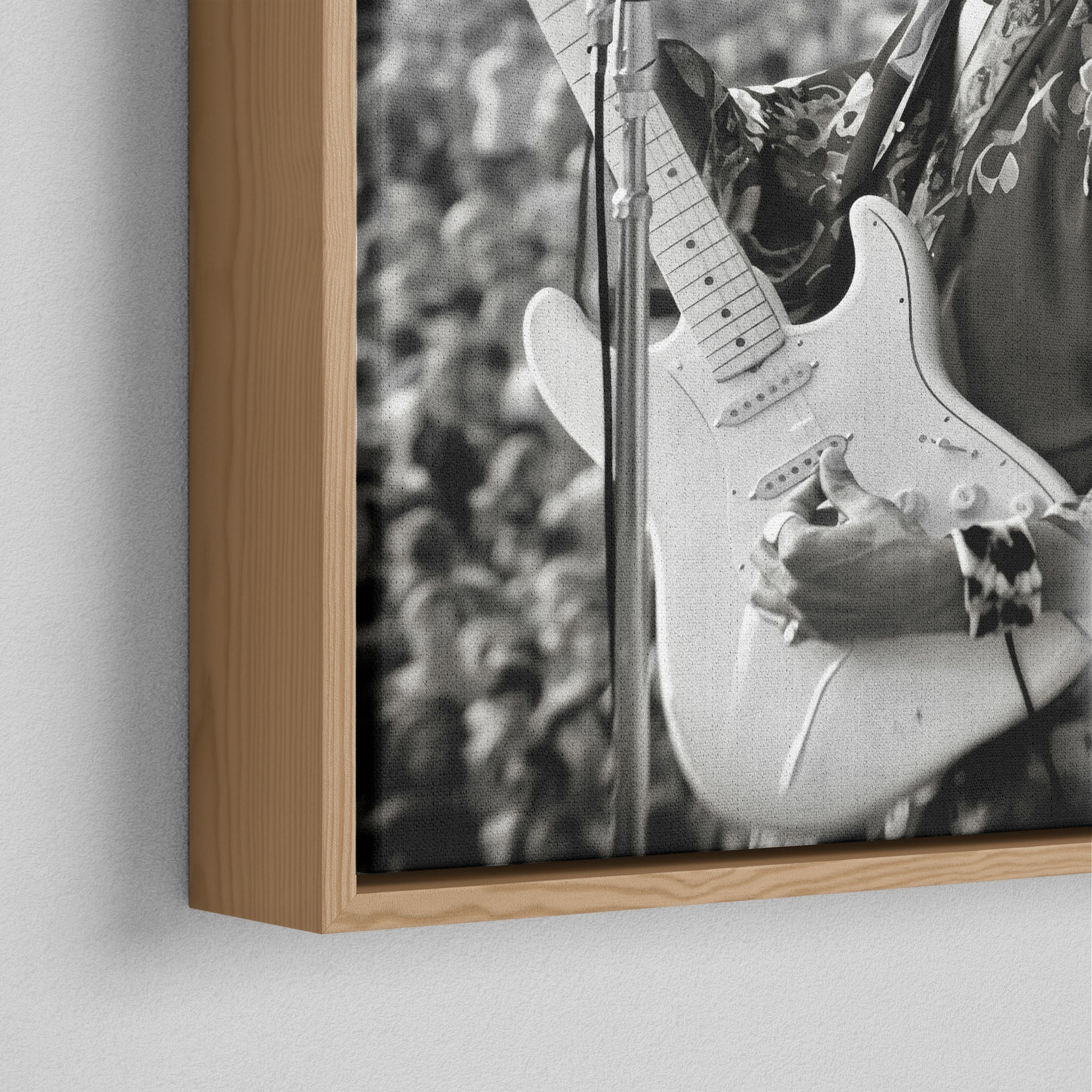 Corner close-up of the natural oak floating frame on the Jimi Hendrix black and white canvas
