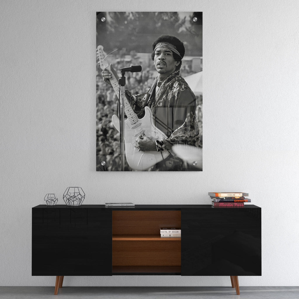 High-gloss acrylic black and white print of Jimi Hendrix displayed on a wall