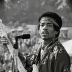Zoomed detail of Jimi Hendrix's kimono and white hybrid Stratocaster in black and white