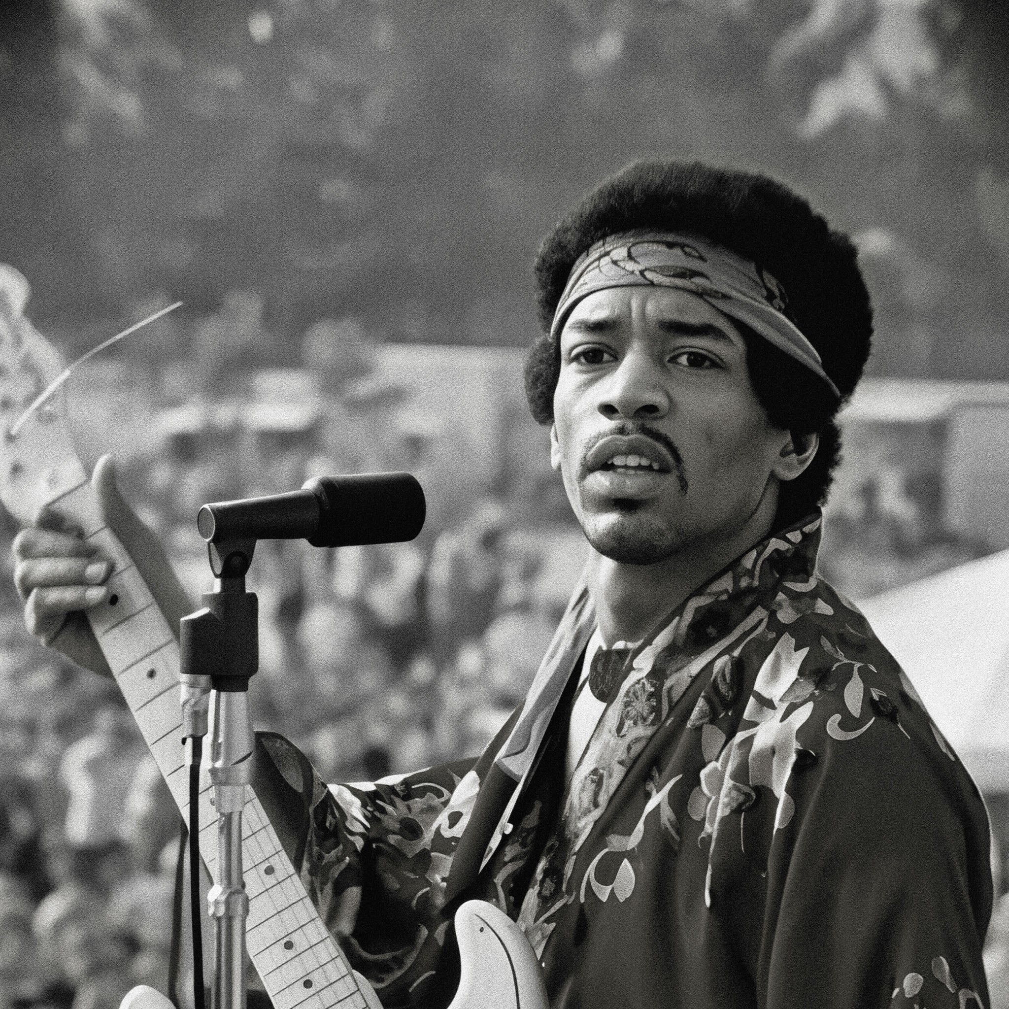 Zoomed detail of Jimi Hendrix's kimono and white hybrid Stratocaster in black and white