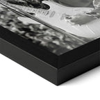 Close-up of the Jimi Hendrix black and white poster in a classic black wood frame