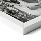 Corner close-up of the Jimi Hendrix black and white poster in a white frame