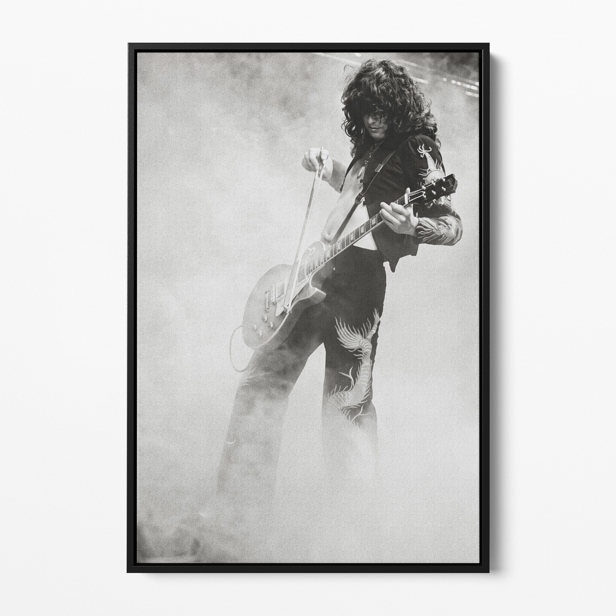 Front display of the Jimmy Page black and white canvas in a black floating frame