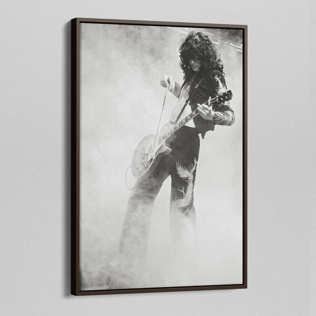 Angled view of the Jimmy Page black and white canvas in a dark walnut floating frame
