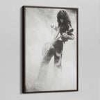 Angled view of the Jimmy Page black and white canvas in a dark walnut floating frame