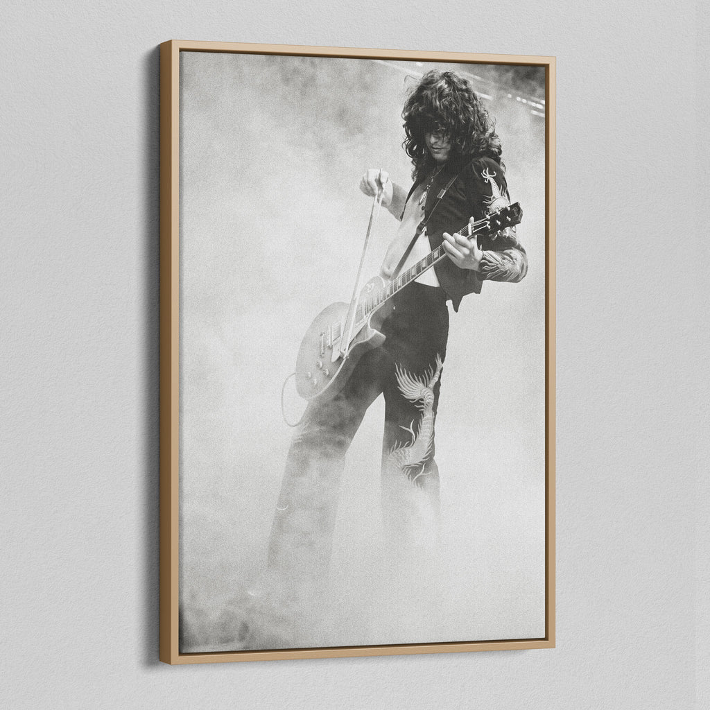 Angled view of the Jimmy Page black and white canvas in a natural oak floating frame