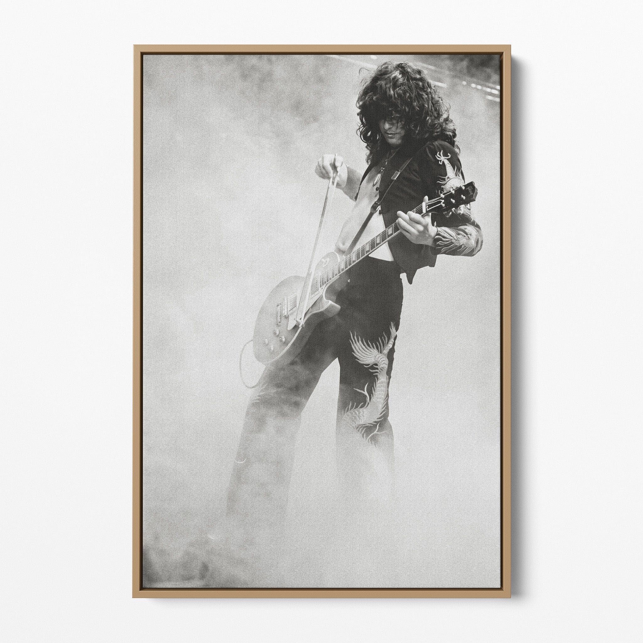 Front display of the Jimmy Page black and white canvas in a natural oak floating frame