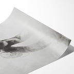 Angled close-up of the unframed Jimmy Page black and white poster showing fine paper detail