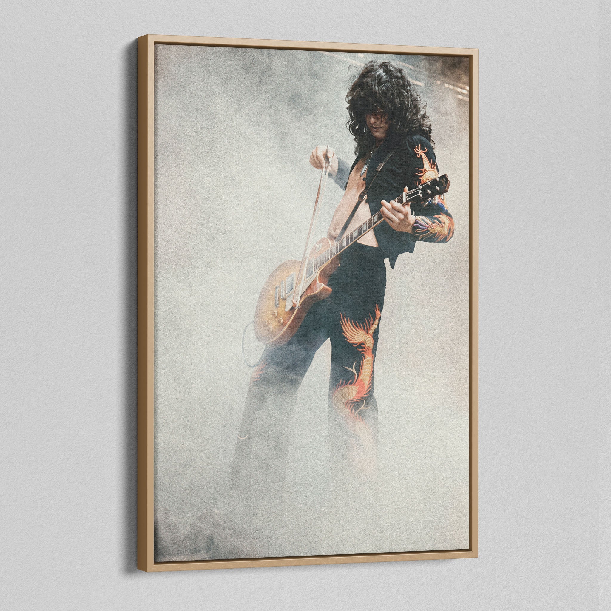 Angled view of the Jimmy Page colorized canvas in a natural oak floating frame