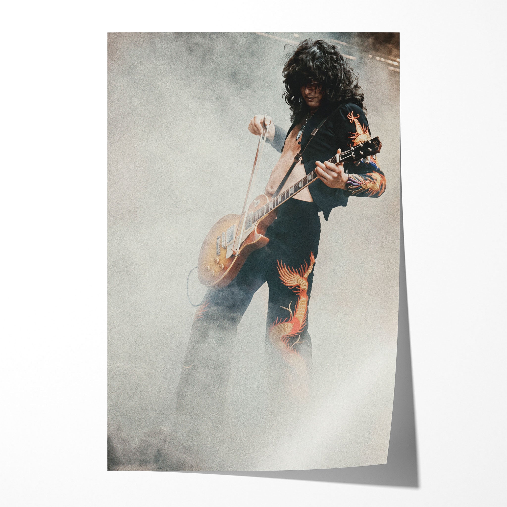 Unframed colorized print of Jimmy Page performing the violin bow solo at Tampa 1973