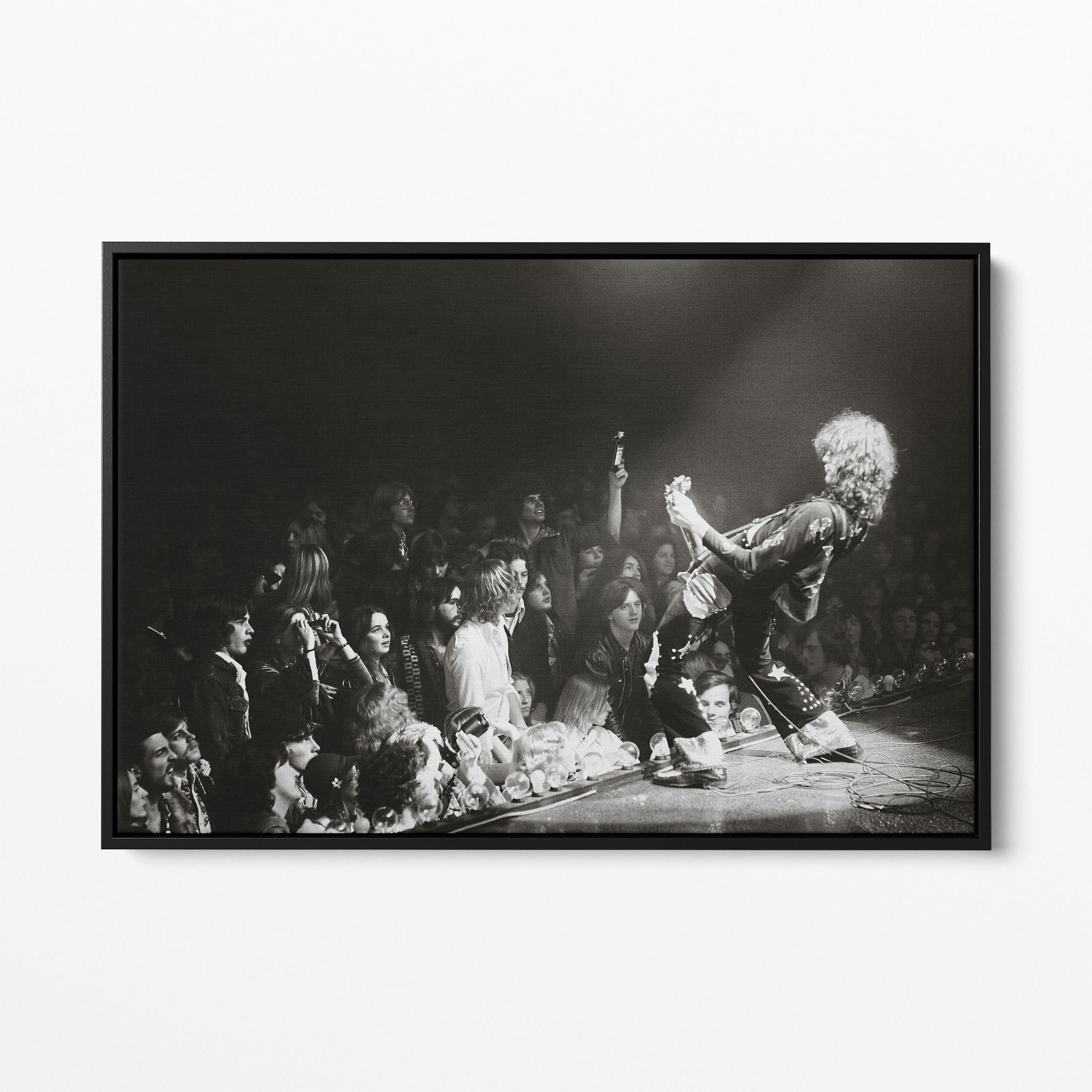 Front display of the Jimmy Page black and white canvas in a black floating frame