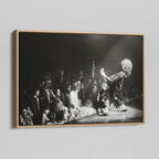Angled view of the Jimmy Page black and white canvas in a natural oak floating frame