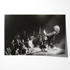 Unframed black and white print of Jimmy Page in his Black Dragon suit at Detroit 1975