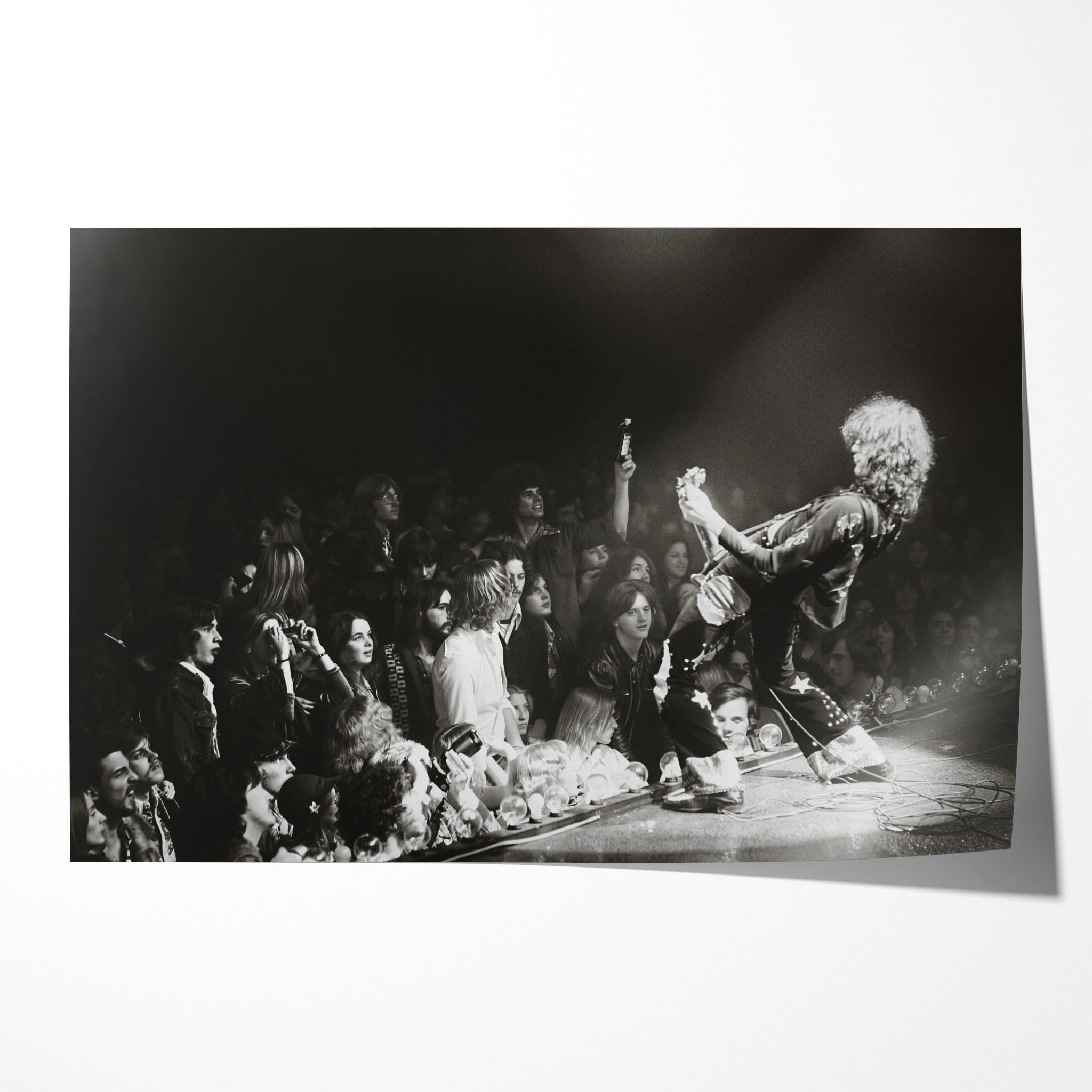 Unframed black and white print of Jimmy Page in his Black Dragon suit at Detroit 1975