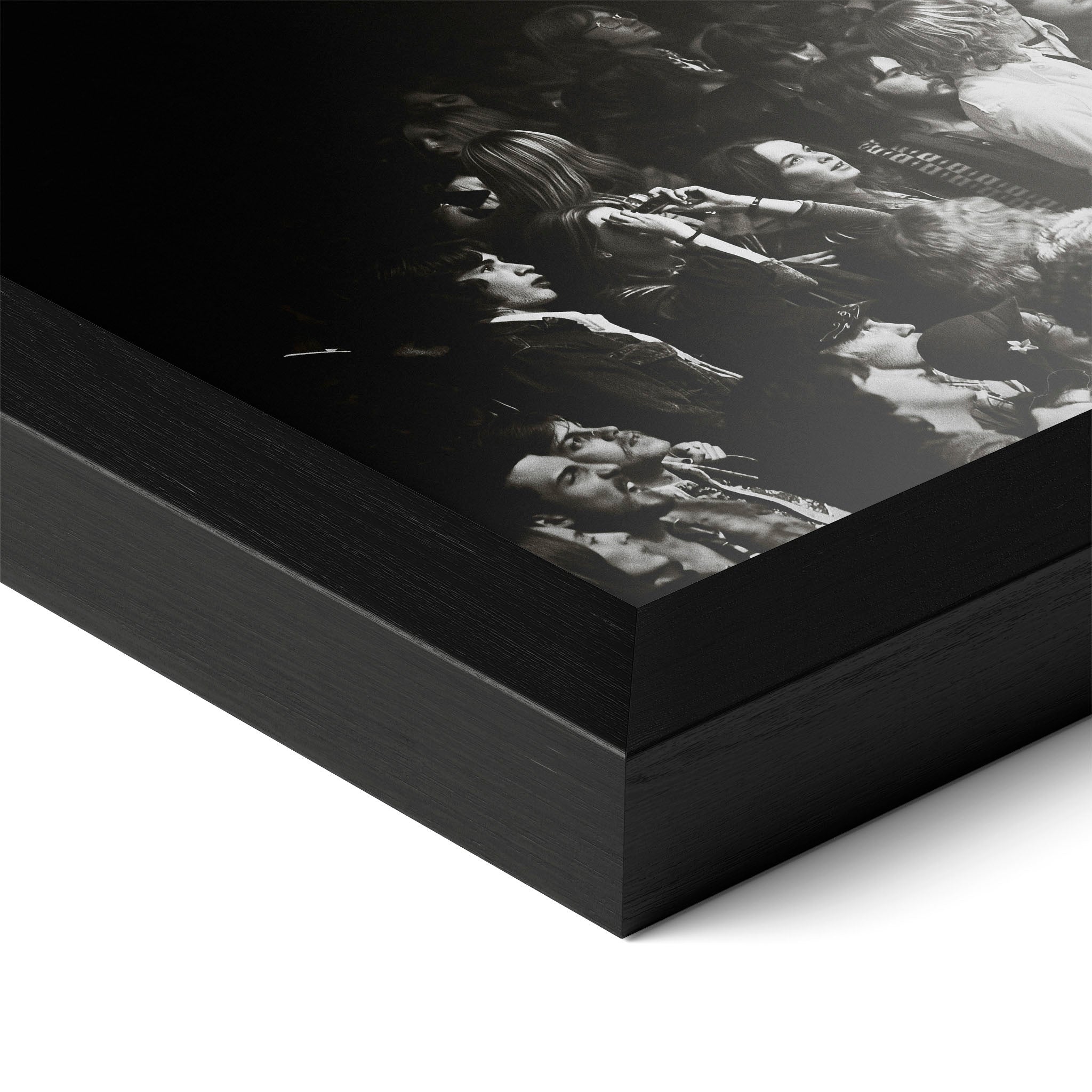 Close-up of the Jimmy Page black and white poster in a classic black wood frame