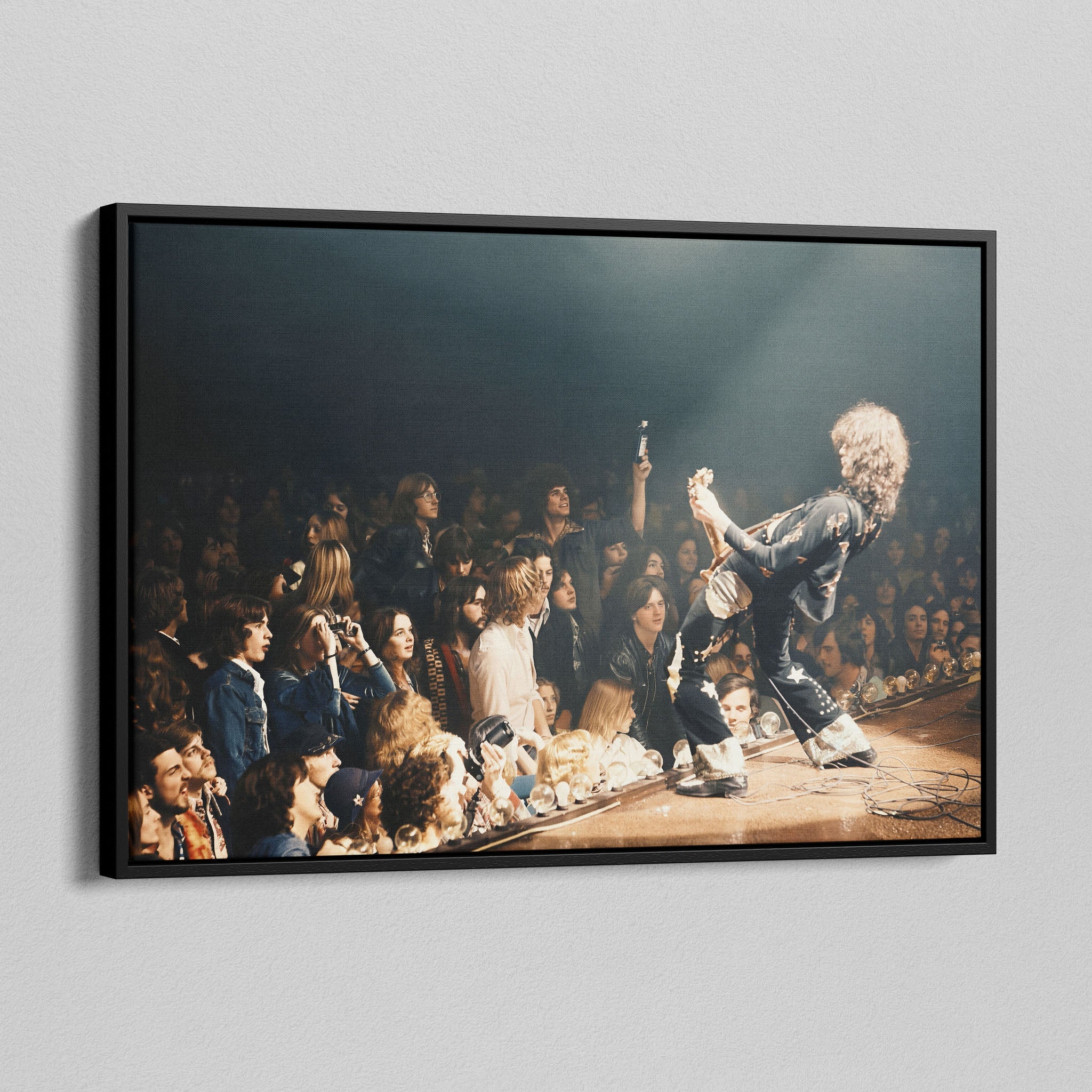 Angled view of the Jimmy Page colorized canvas in a black floating frame