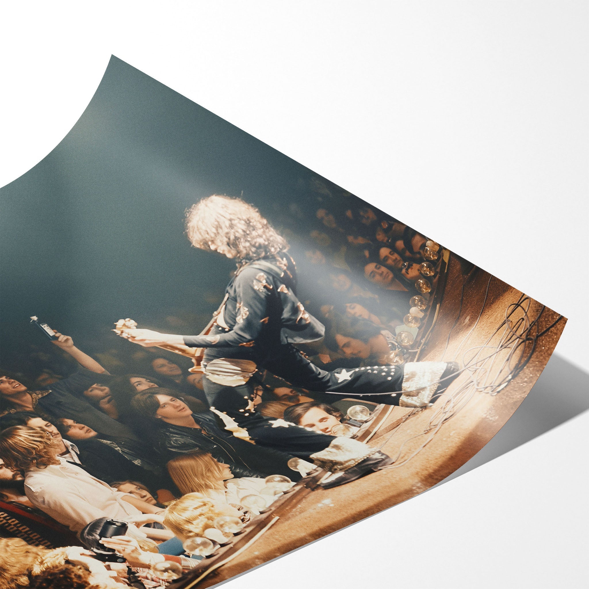 Angled close-up of the unframed Jimmy Page colorized poster showing fine paper detail