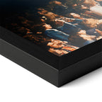 Close-up of the Jimmy Page colorized poster in a classic black wood frame