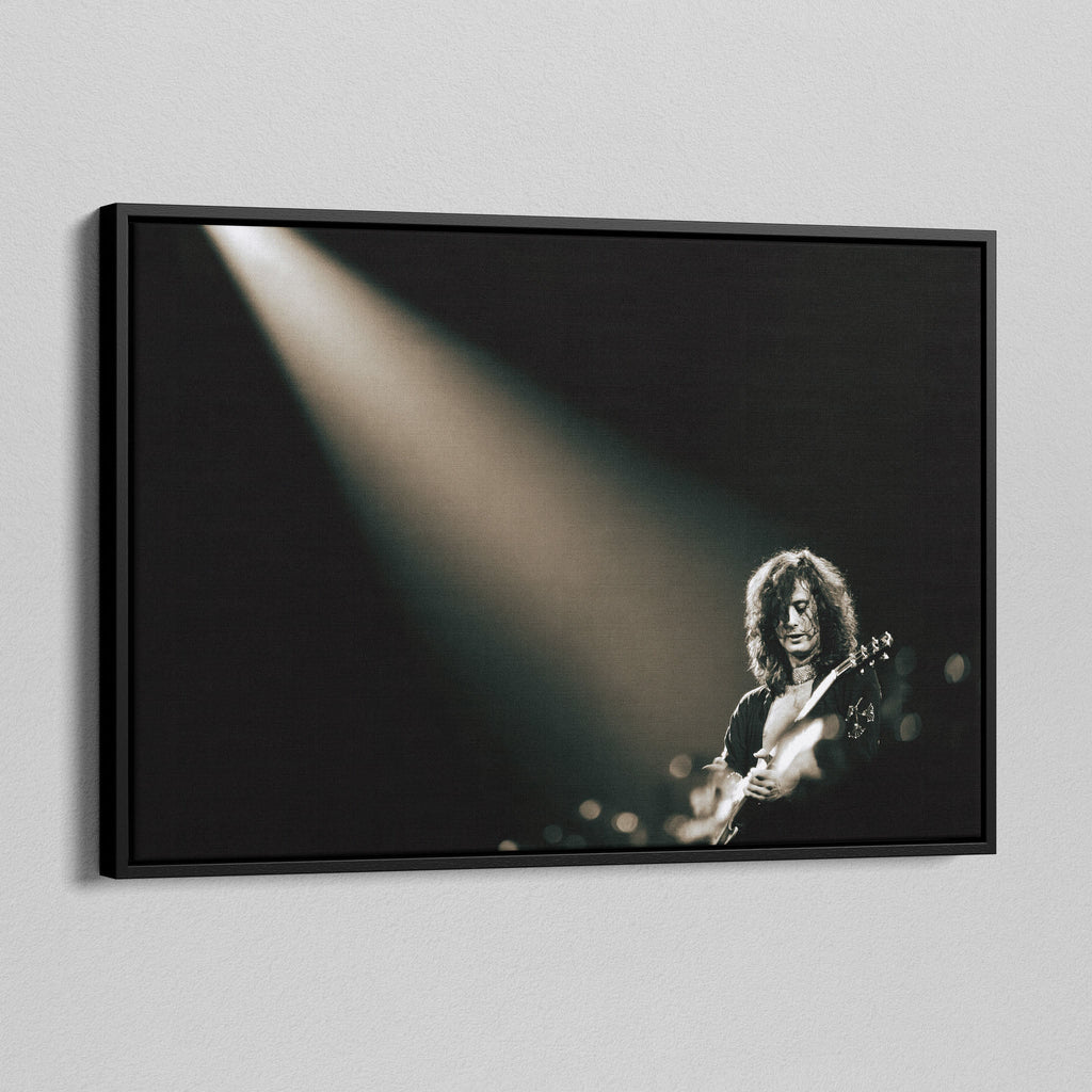 Angled view of the Jimmy Page canvas in a black floating frame