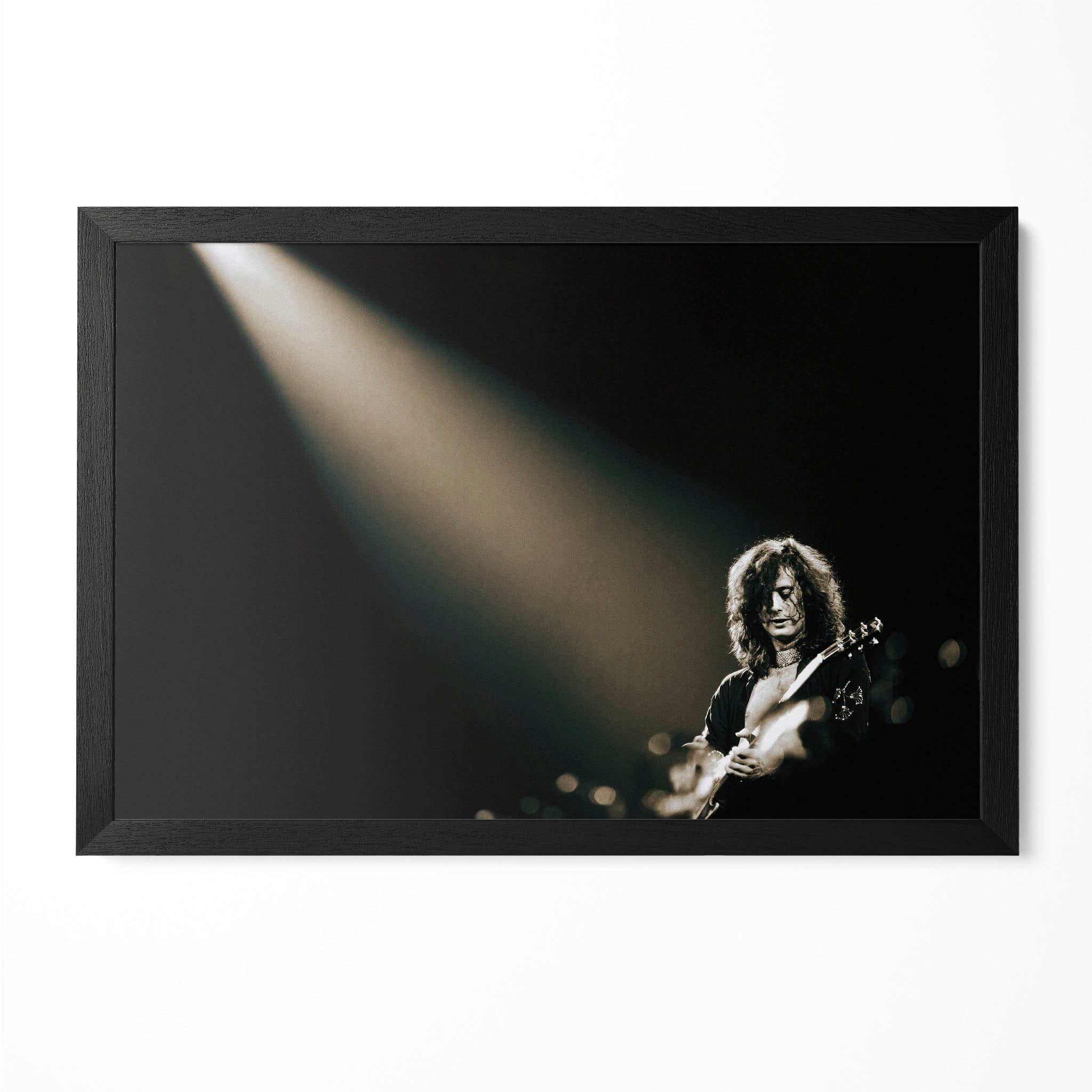 Jimmy Page 1975 Madison Square Garden spotlight portrait in a classic black poster frame