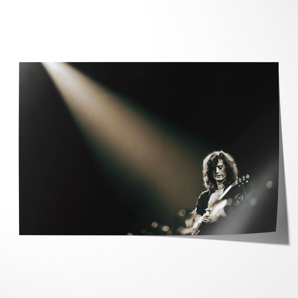 Unframed print of Jimmy Page under a lone spotlight at Madison Square Garden 1975