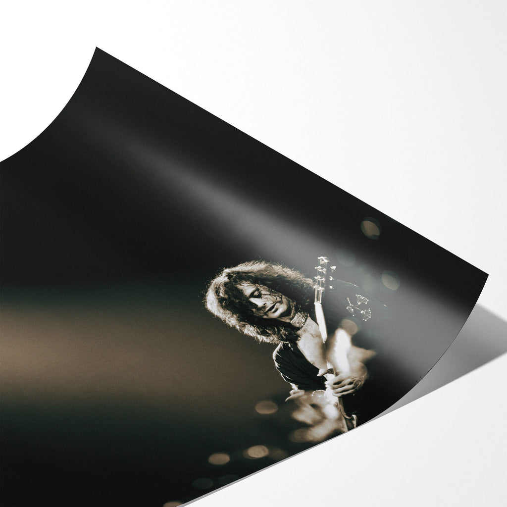 Angled close-up of the unframed Jimmy Page poster showing fine paper detail