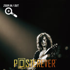 Zoomed detail of Jimmy Page playing slide guitar in a lone spotlight, 1975
