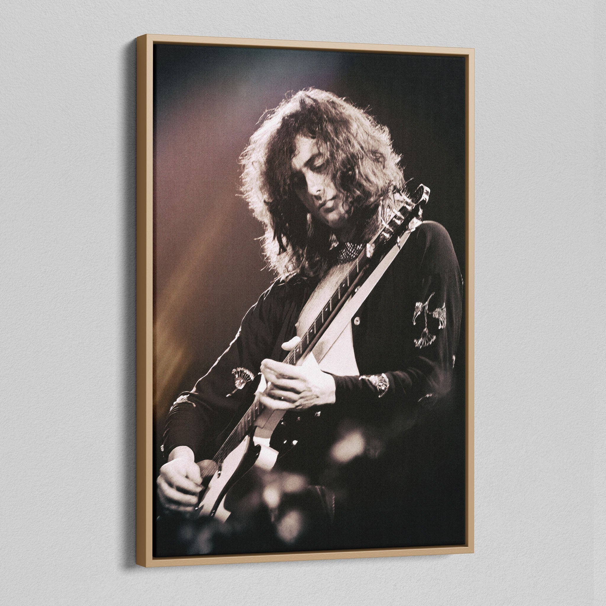 Angled view of the Jimmy Page canvas in a natural oak floating frame