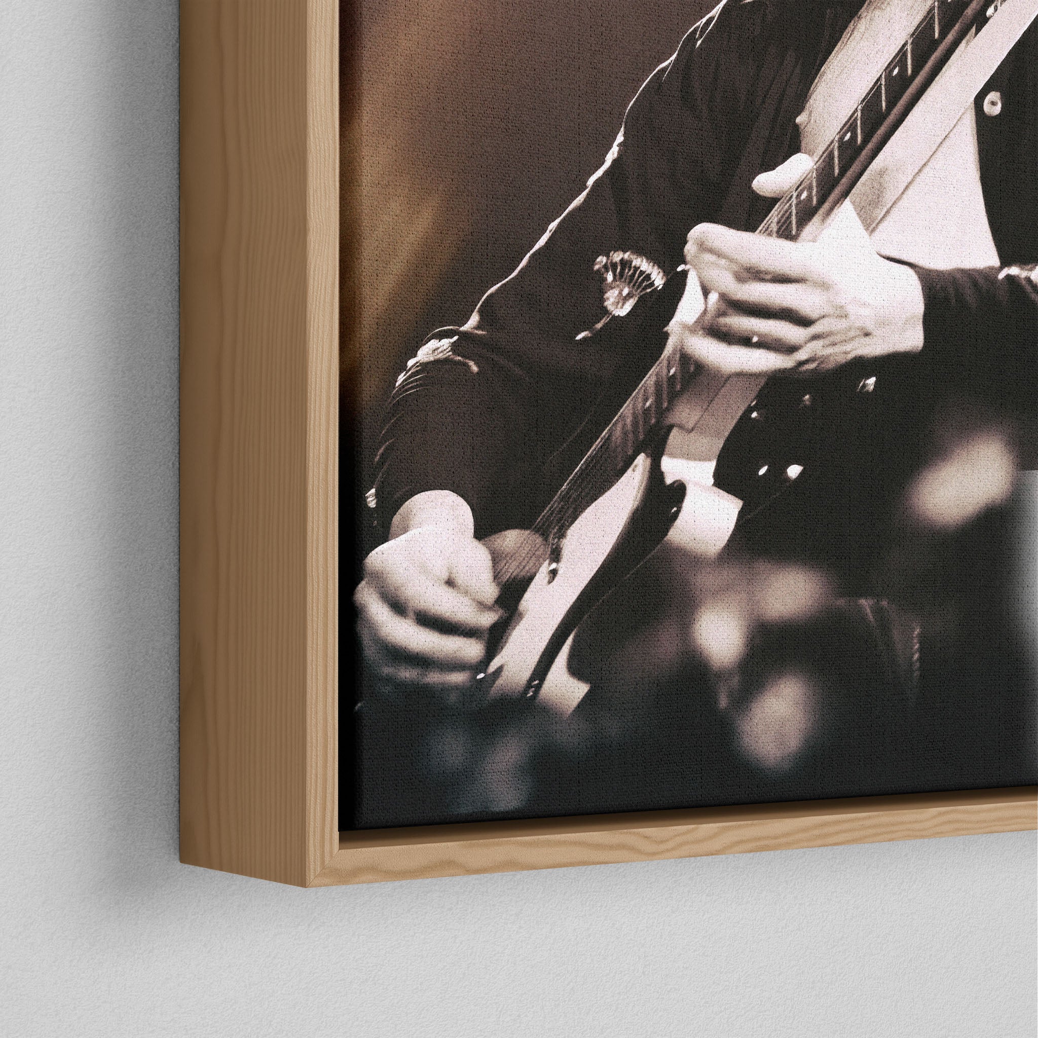 Corner close-up of the natural oak floating frame on the Jimmy Page canvas