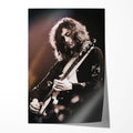 Unframed print of Jimmy Page playing slide guitar at Madison Square Garden 1975