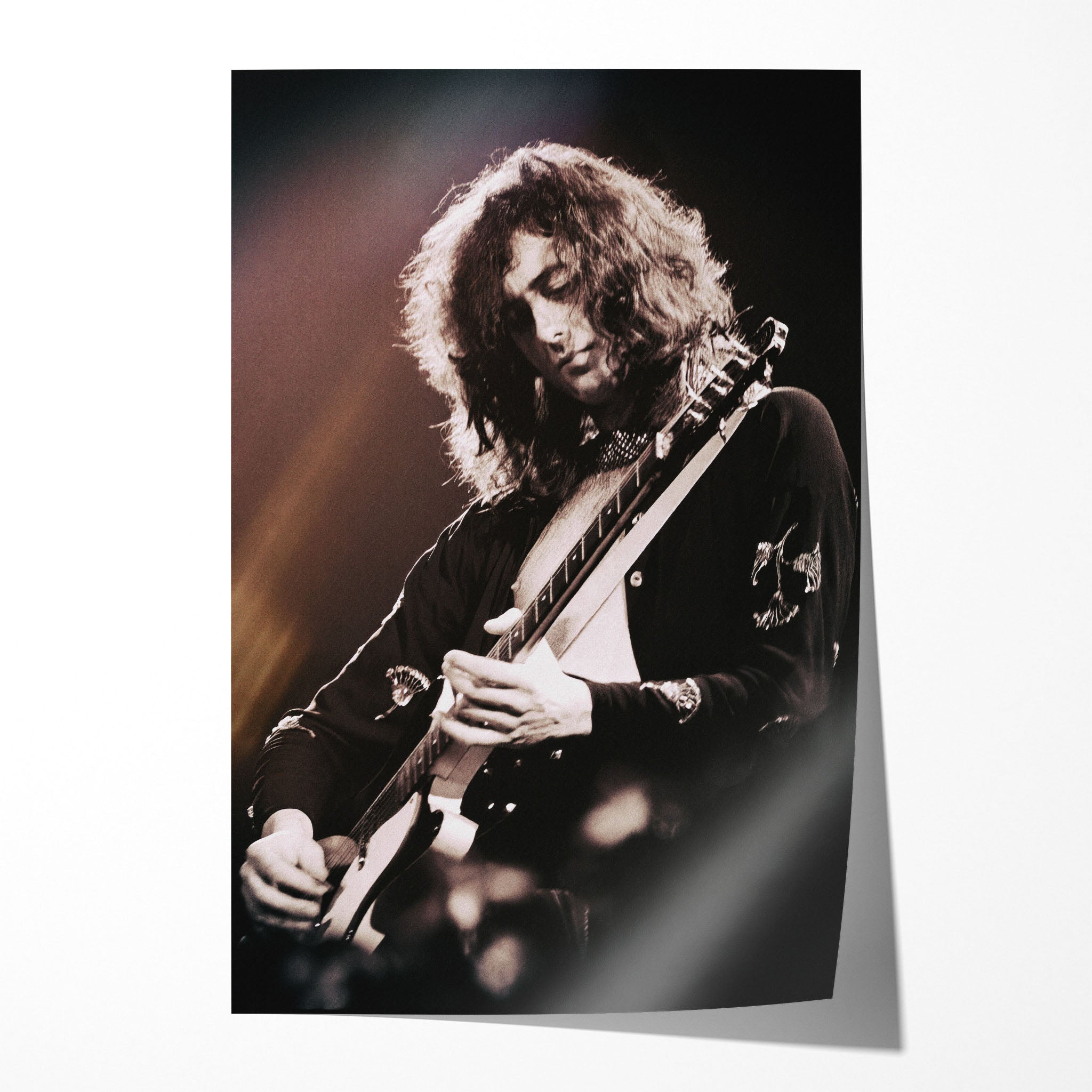 Unframed print of Jimmy Page playing slide guitar at Madison Square Garden 1975