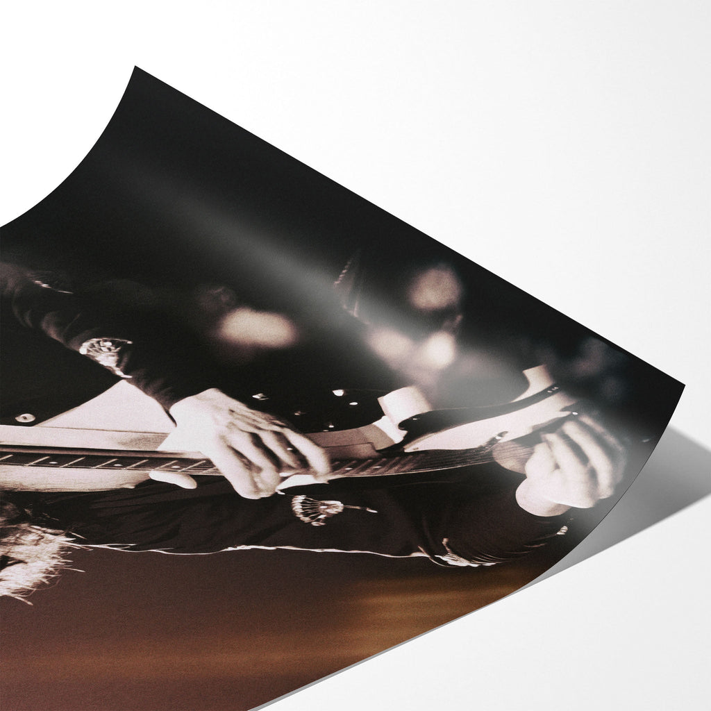 Angled close-up of the unframed Jimmy Page poster showing fine paper detail