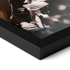 Close-up of the Jimmy Page poster in a classic black wood frame