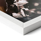 Corner close-up of the Jimmy Page poster in a white frame