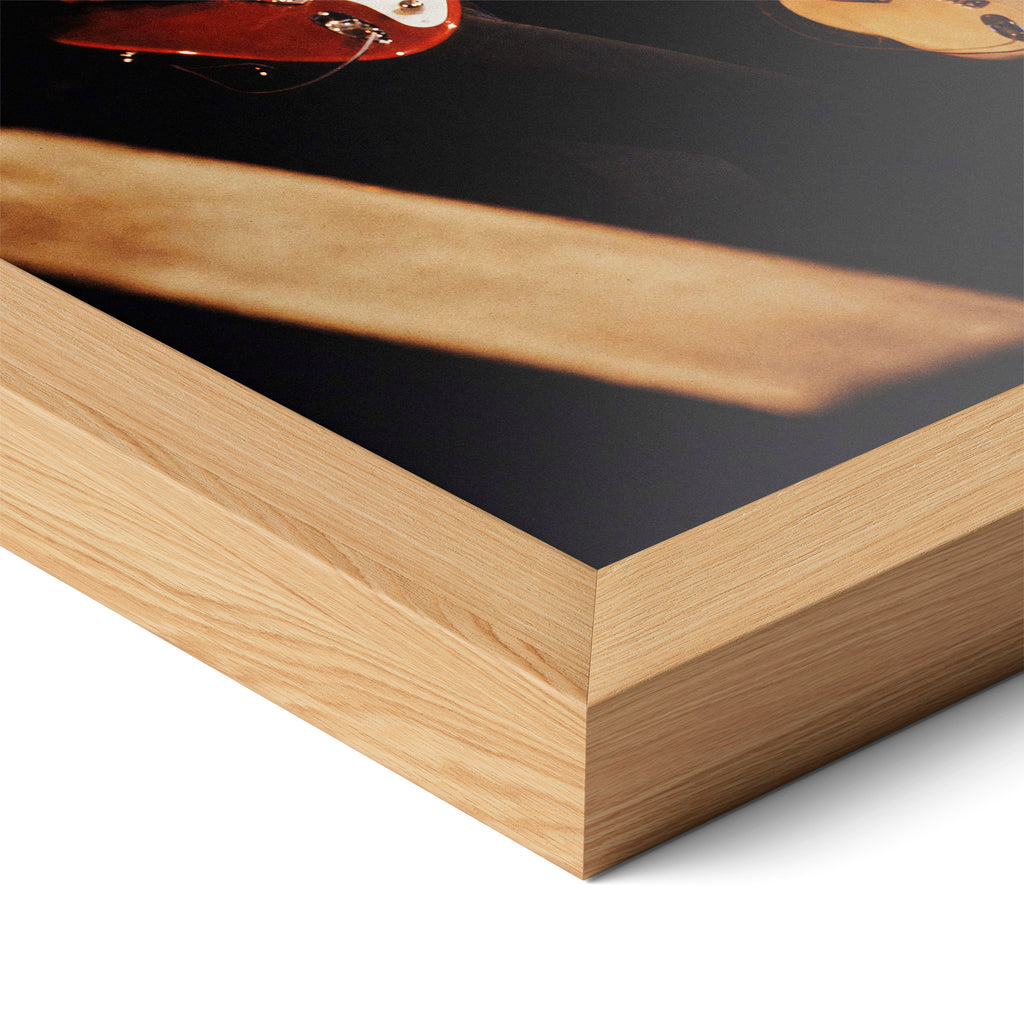 Close-up of the natural oak frame on the Mark Knopfler color poster