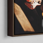 Close-up of the dark walnut floating frame on the Mark Knopfler color canvas