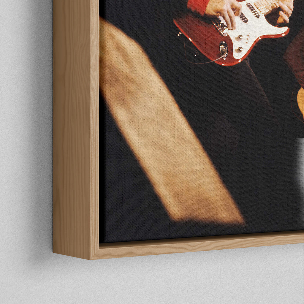 Corner close-up of the natural oak floating frame on the Mark Knopfler color canvas