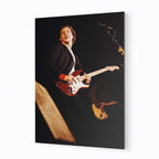 Mark Knopfler 1980 color metal print displayed on a wall