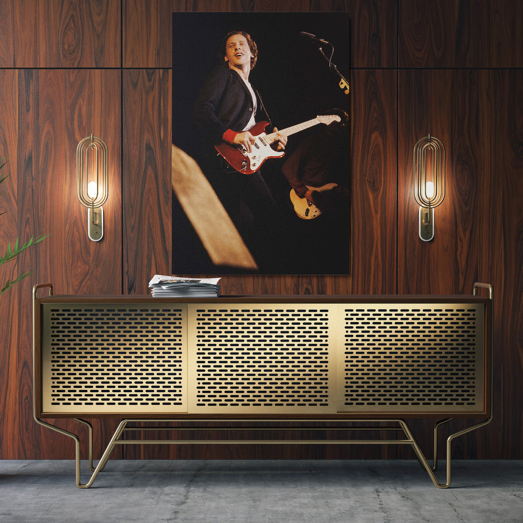 Sleek aluminum color metal print of Mark Knopfler playing live