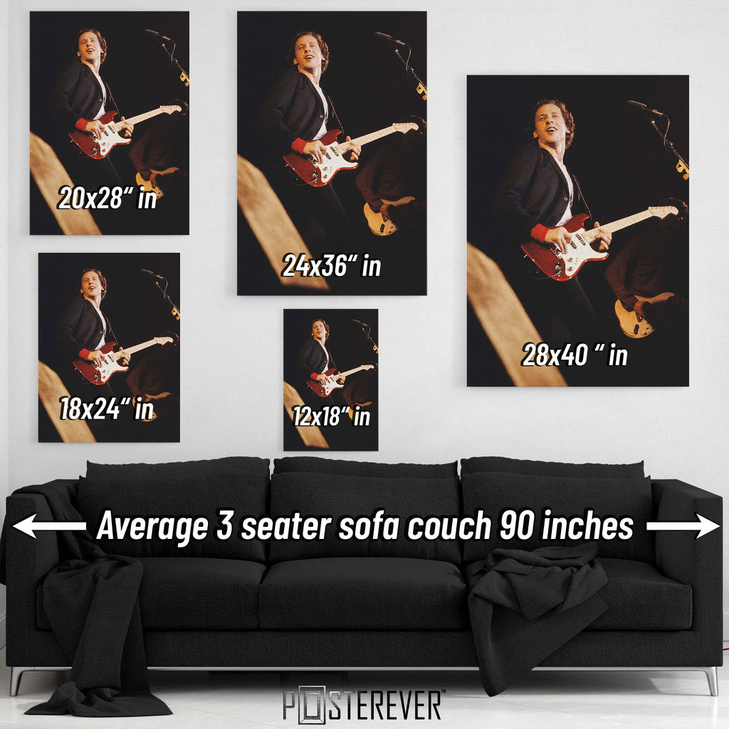 Mark Knopfler wall art size comparison chart shown above a sofa