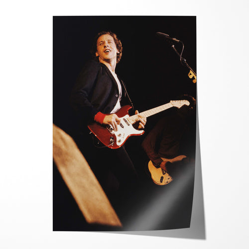 Unframed color print of Mark Knopfler playing a red guitar at The Agora Ballroom, Atlanta, 1980