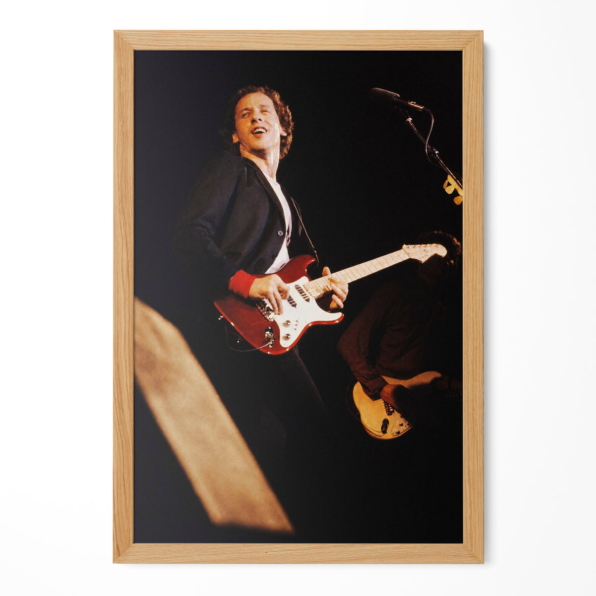 Mark Knopfler color live photo in a natural oak poster frame