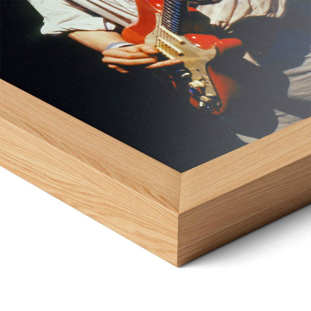 Close-up of the natural oak frame on the Mark Knopfler color poster