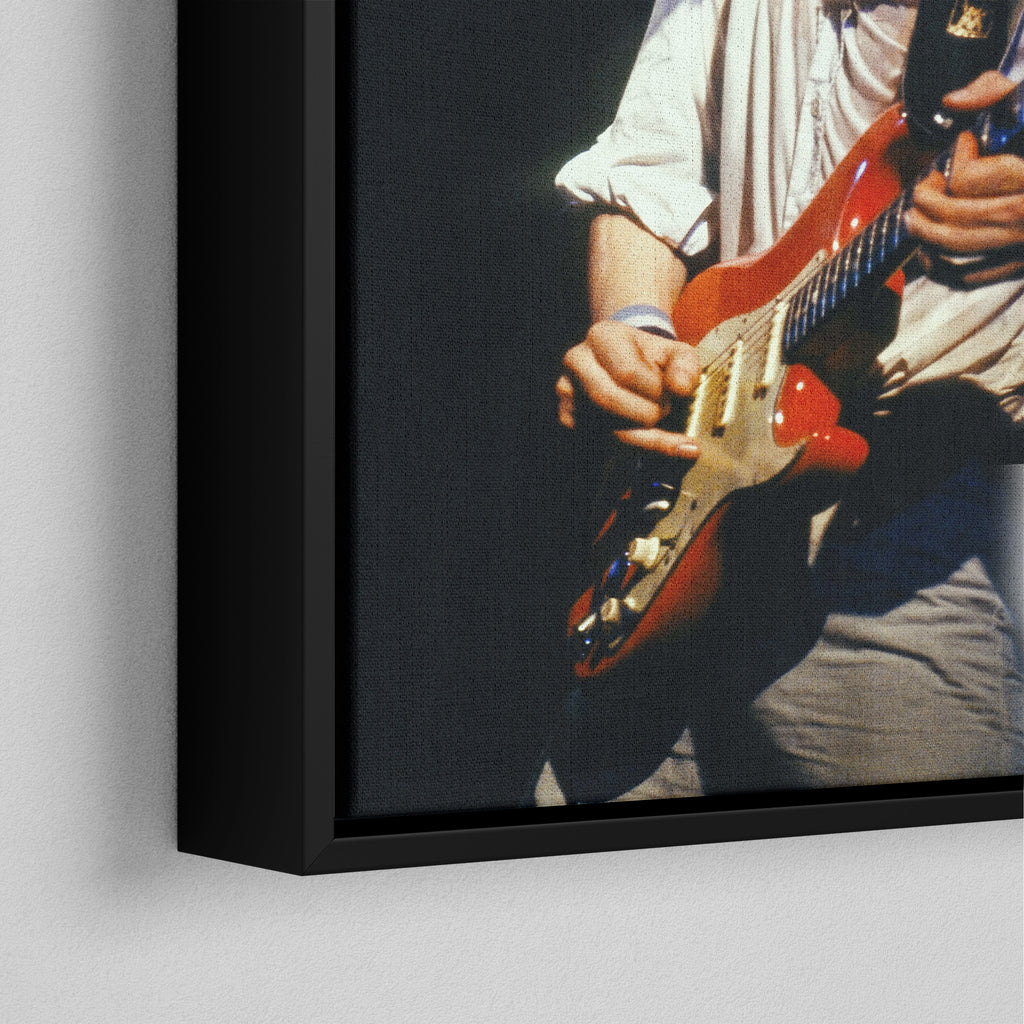 Corner close-up of the black floating frame on the Mark Knopfler color canvas